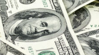 What gives paper money its actual value?